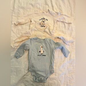 Unworn! Set of three long sleeve onesies. Size 6 months. Carter’s